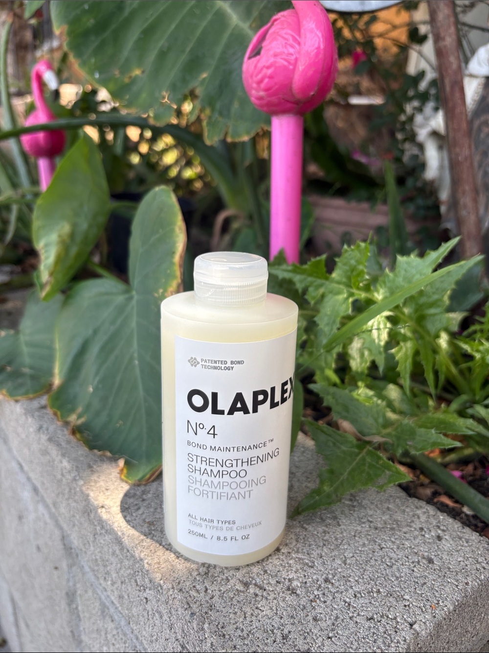 OLAPLEX No.4 Strengthening Shampoo - White Bottle with Black Text